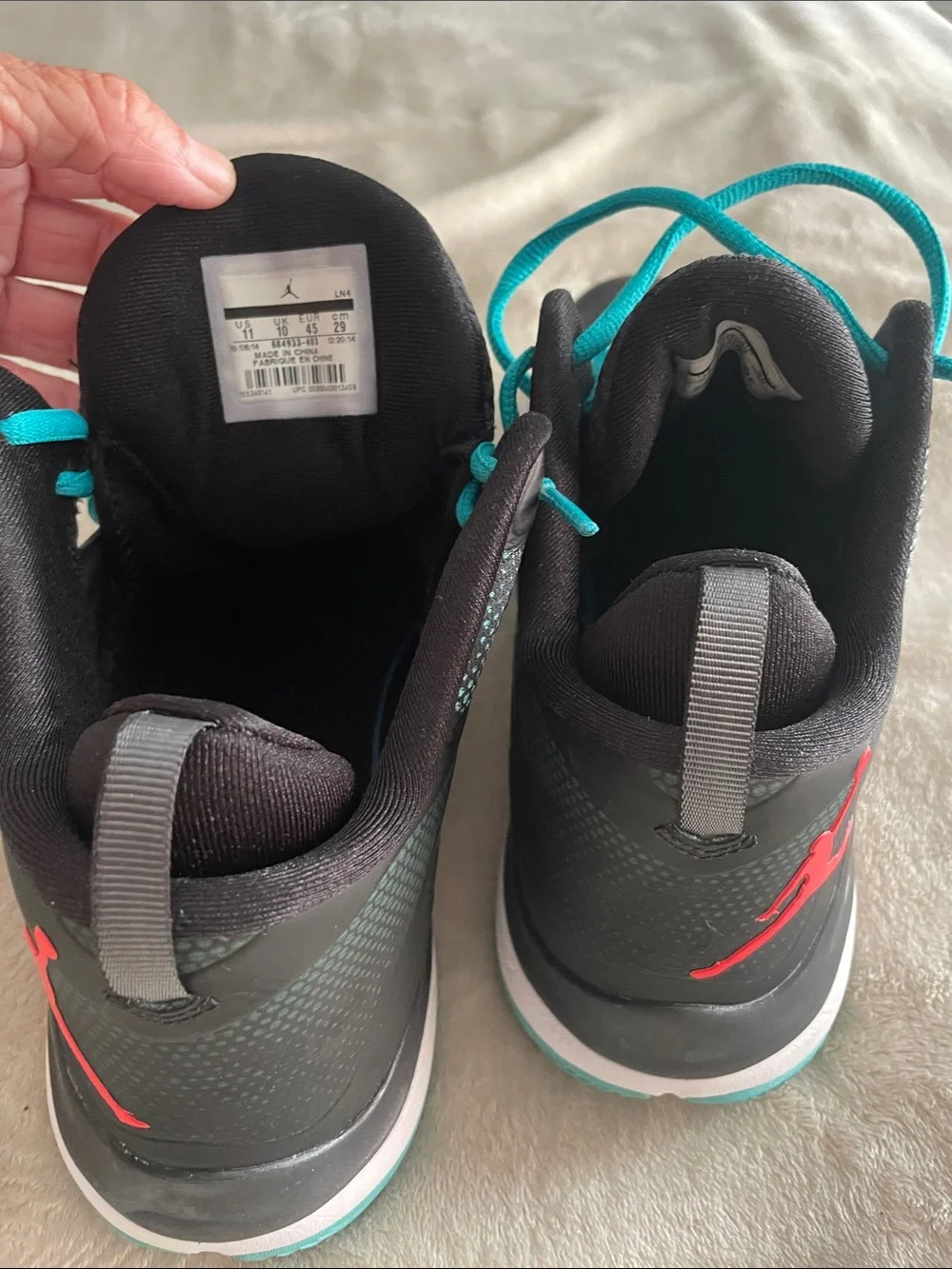 Jordan Black & Teal Low-Top Basketball Shoes with Red Accents